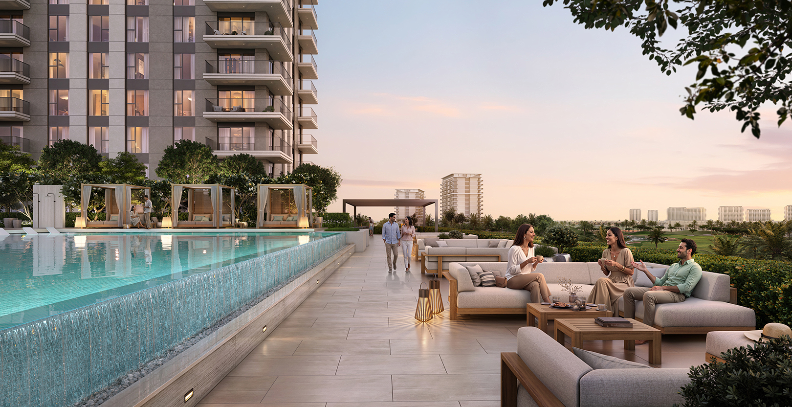 Private cabanas beside the amenity pool at sunset