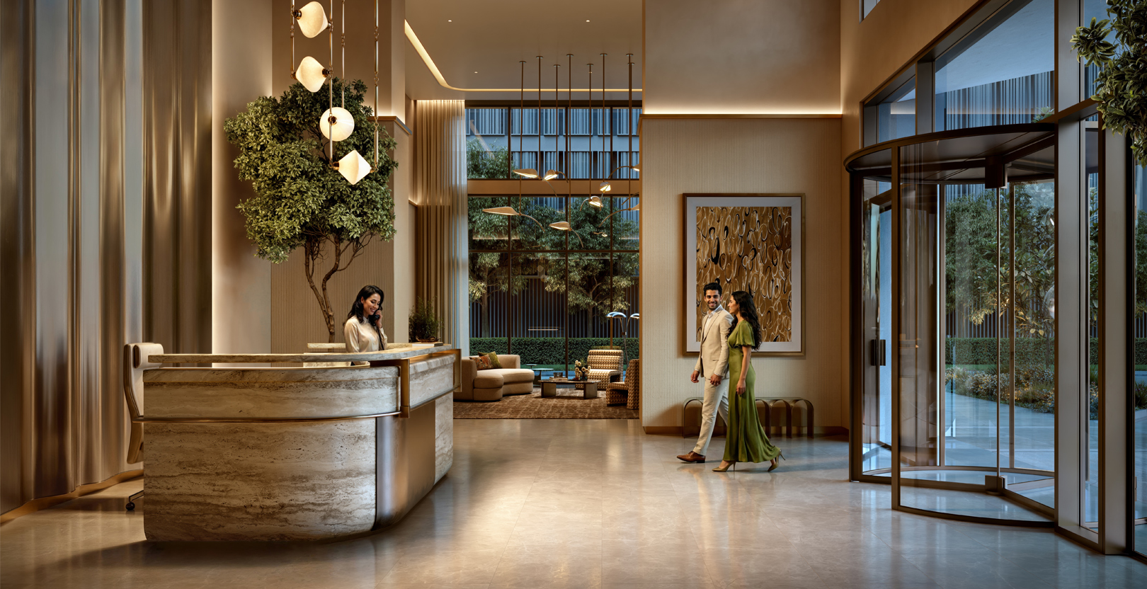 Grand high-ceiling lobby at Valia with concierge desk and lounge